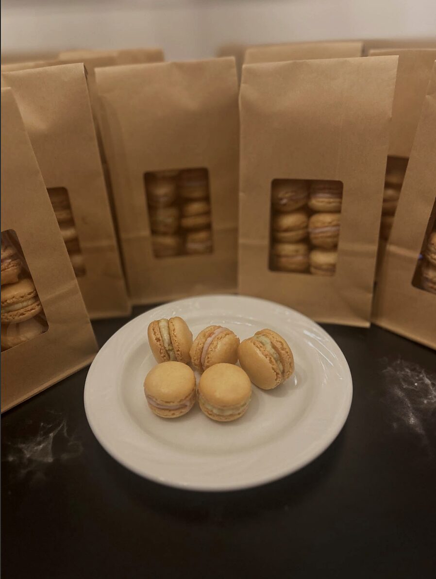 Macarons plated with kraft window gift bags