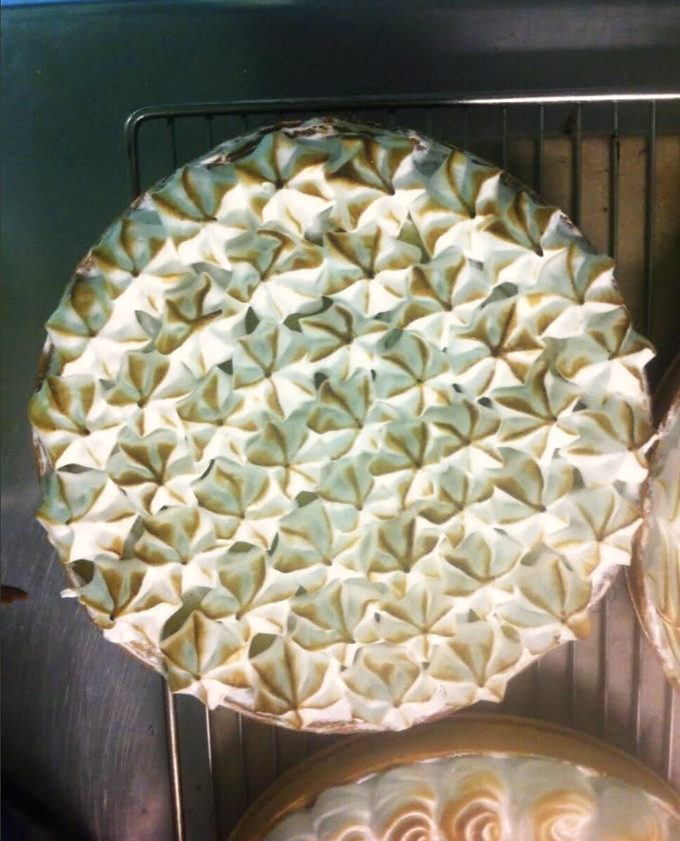 Tarte citron meringuée topped with dozens of torched meringue stars
